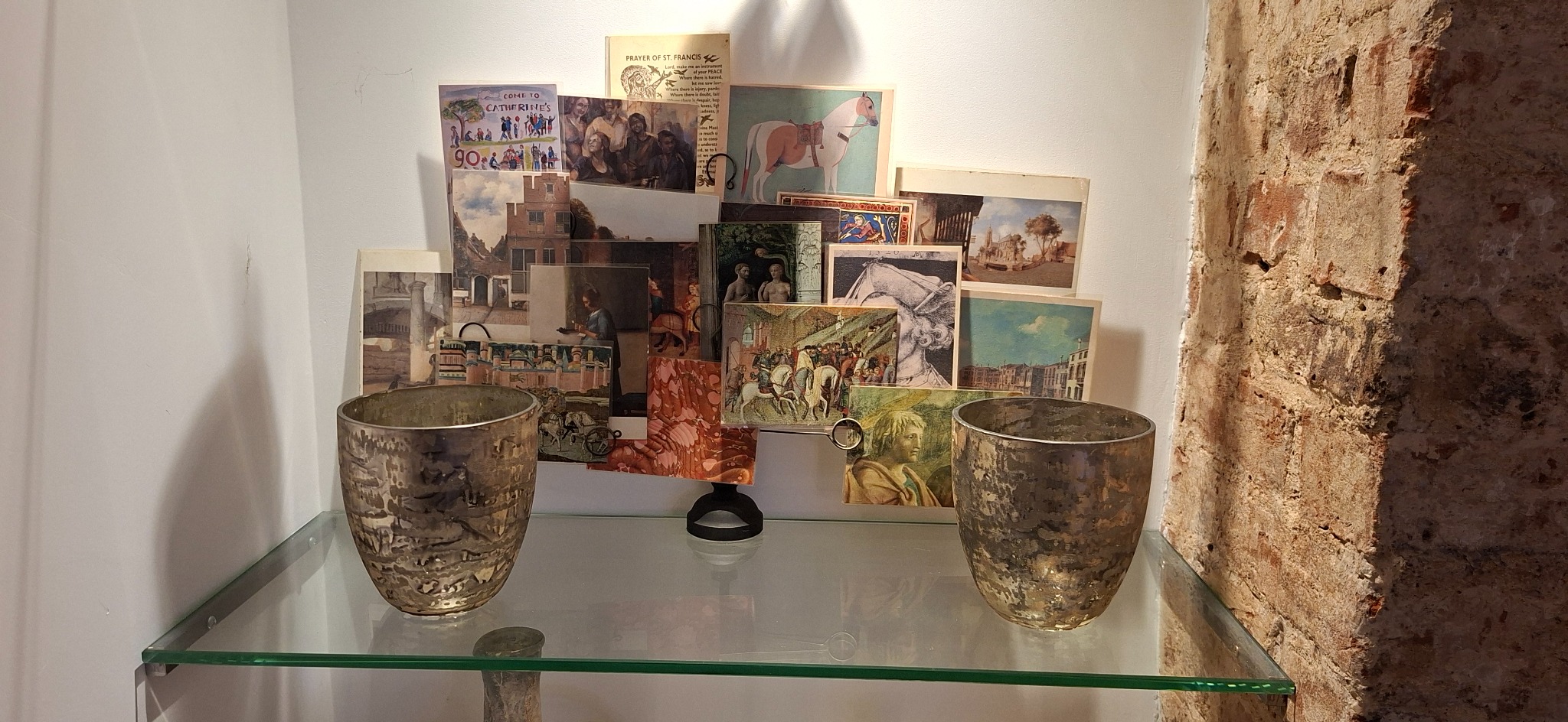 A personal collection of postcards and pictures displayed at Havisham House
